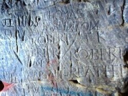 Robert Greathead carving in dungeon